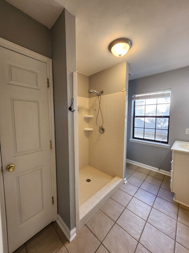 Building Photo - Remodeled 2 bedroom duplex with all wood floors for rent May 6, 2026 for $1350 per month