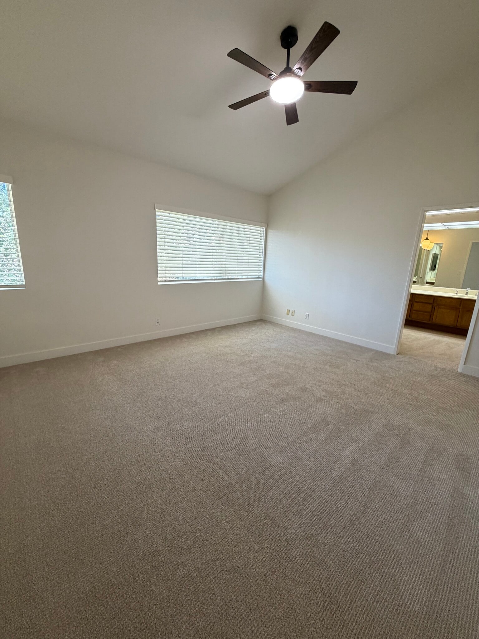 Light and airy primary bedroom - 18241 Andrea Cir N