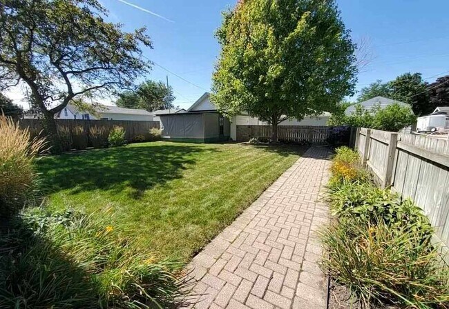 Fenced in backyard, shared with Lower - 7114 27th Ave