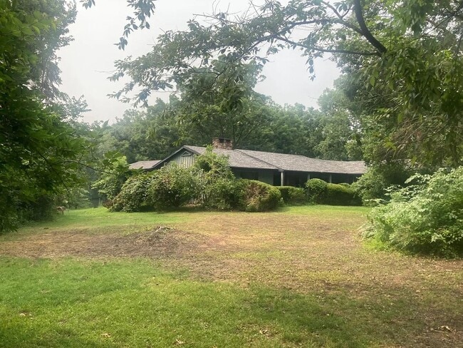 Building Photo - Beautiful Duplex Located in Serene, Wooded...