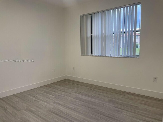 Building Photo - 6700 NW 114th Ave