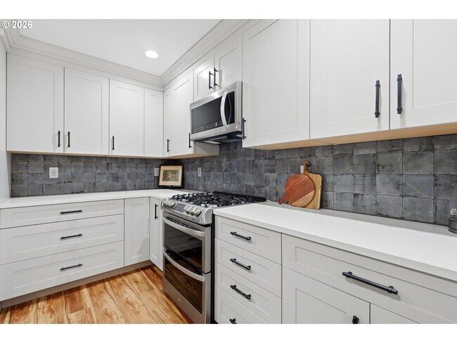 Building Photo - Beautifully Updated 5BR Home with Designer Kitchen, Main-Level Suite & Private Backyard Oasis Nea...