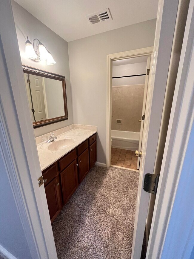 Building Photo - 8570 Meadow Green Dr