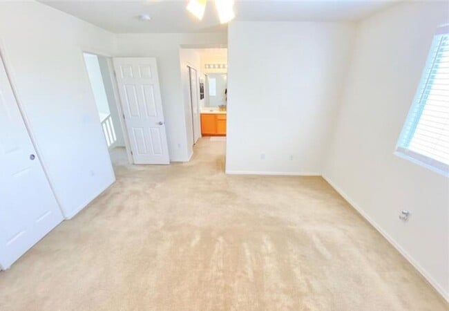 Building Photo - ENJOY THIS STUNNING 3 BEDROOM WITH A TRANQ...