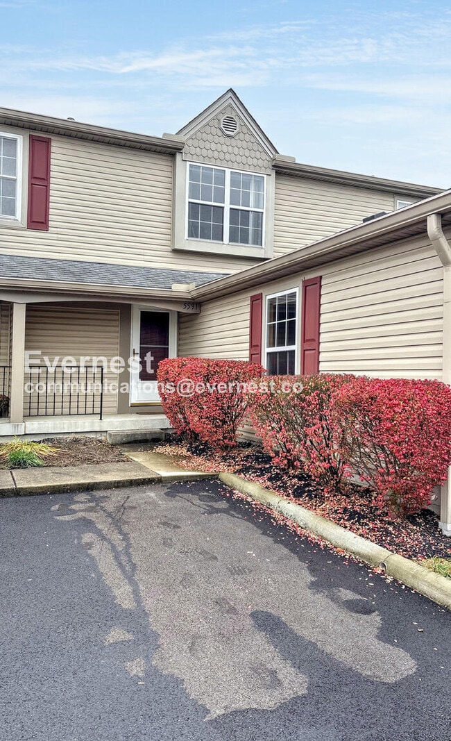 Building Photo - Spacious Condo with Modern Amenities and Garage Parking