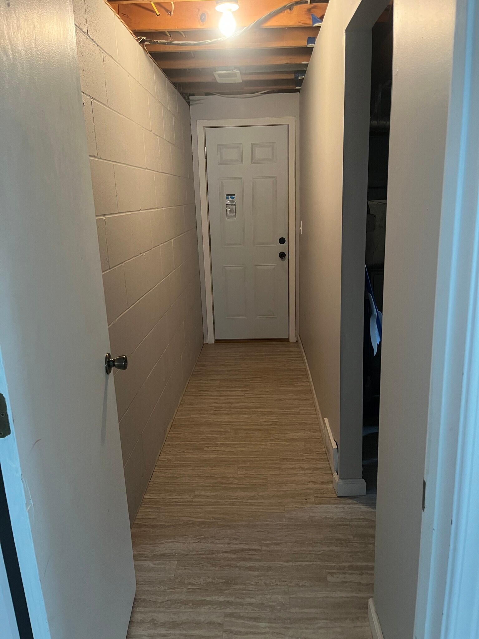 Hallway to attached garage - 502 Sunnyside Ln