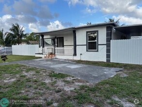 Building Photo - 10635 NW 12th Ave