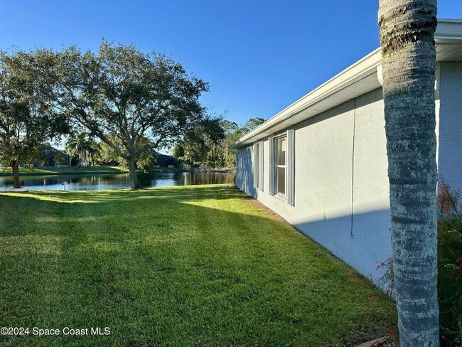 Building Photo - Charming Four Bedroom Home with a Beautiful Pond in the Back