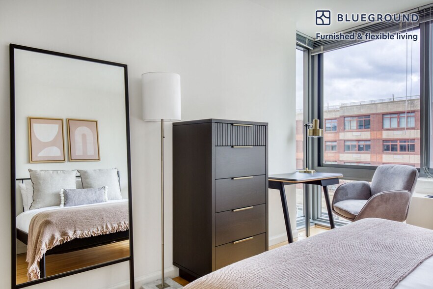 Building Photo - 4-75-75 48th Ave