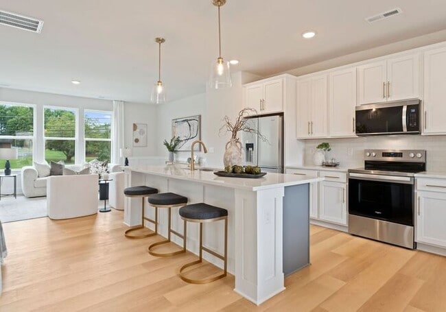Building Photo - FREE RENT! Stunning 4 Bed | 3.5 Bath Luxury Townhome at The Towns at Rocky River