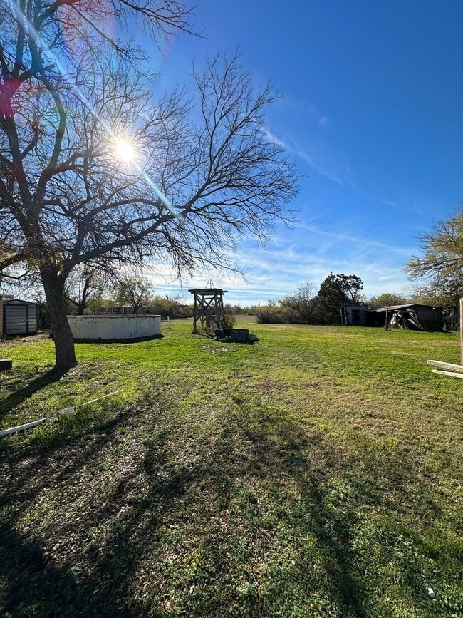 Building Photo - COMING MAY 2026! Charming 4-Bedroom Home + Huge Lot!