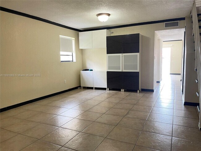 Building Photo - 5470 W 26th Ct