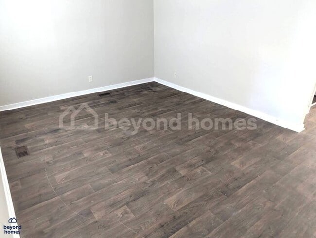 Building Photo - Updated Bungalow with Massive Deck and Fully Fenced Yard!