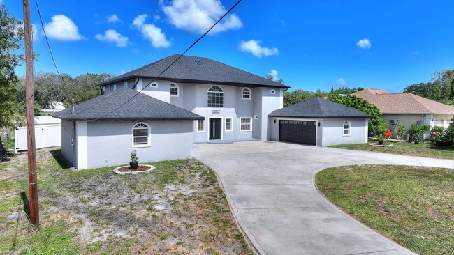 Building Photo - Rare Luxury Lease Opportunity | Spectacular 5-Bedroom Pool Estate on Nearly ¾ Acre Near Gulf Beaches