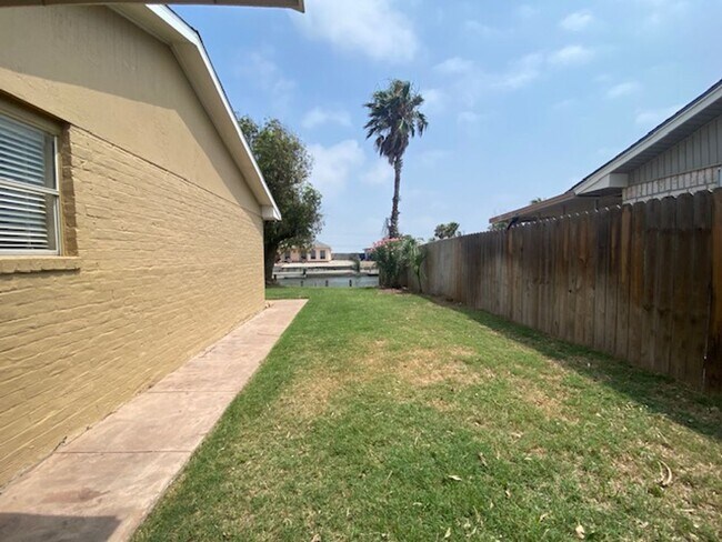 Building Photo - WATERFRONT HOME W/ FENCED YARD