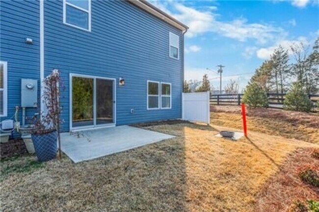 Building Photo - Spacious 3-Bedroom Townhome with Private Patio, Central HVAC & In-Unit Laundry Hookups
