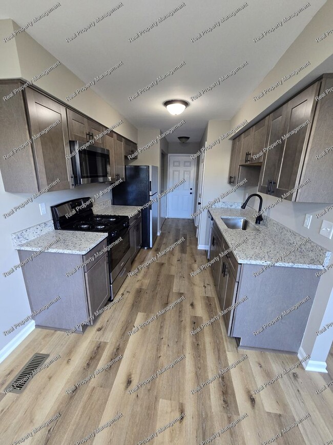 Building Photo - Updated 2 Bedroom Condo