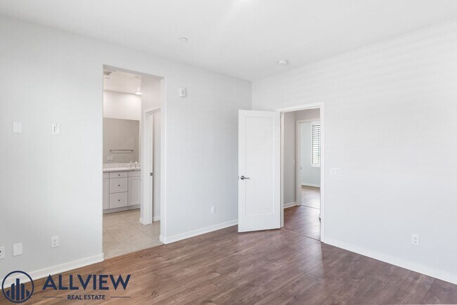 Building Photo - Modern Tri-Level Townhome with Office, 2-Car Garage & Prime Anaheim Location!