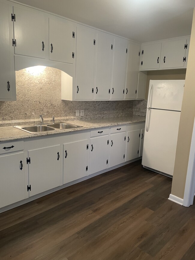 Tons of cabinets and countertops. - 213 Mitchell St