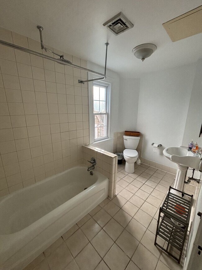 Building Photo - Elegant 3 Story Brick Corner Property Now Available