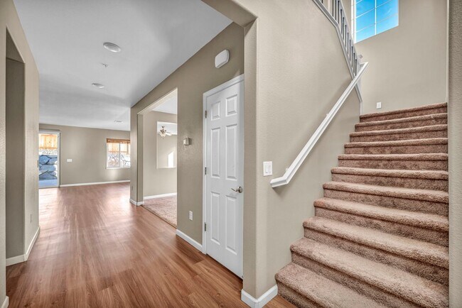 Building Photo - Sun-Filled, Spacious Living with a Three-Car Garage