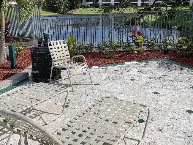 Building Photo - 1865 Palm Cove Blvd