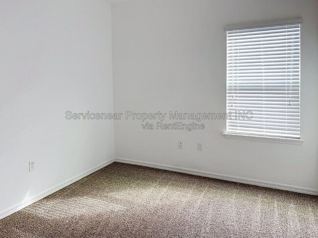 Building Photo - 9428 Woodcrane Dr