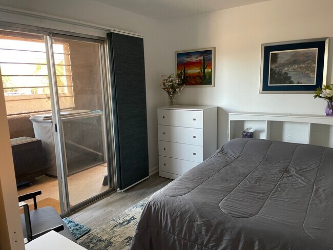 Bedroom with patio access - 1810 E Blacklidge Dr