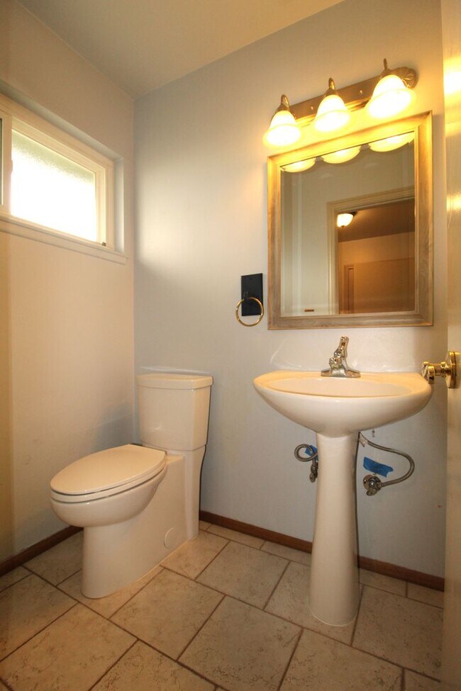 Building Photo - Spacious Corner Lot Home in Desirable Vent...
