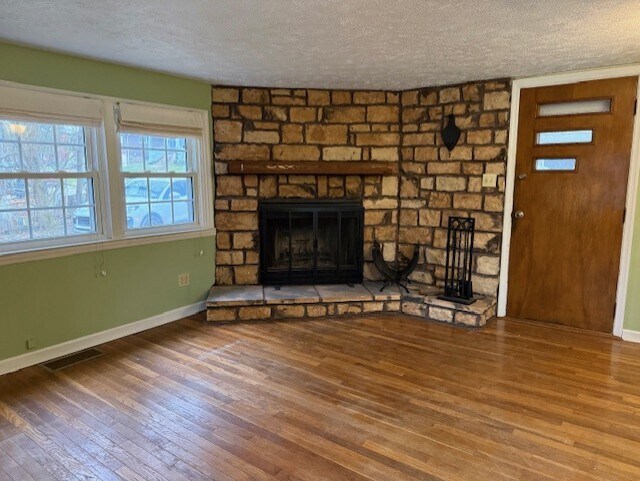 Living room with wood burning fireplace - 16 Leawood Ave