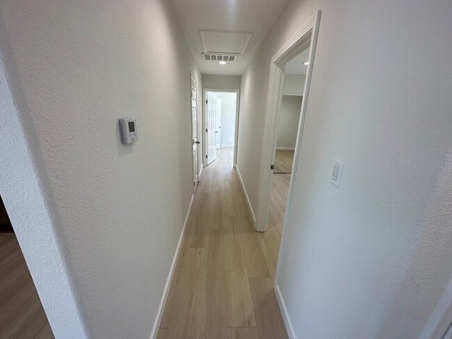 Building Photo - Bright 3BR Home with Central AC, Attached ...