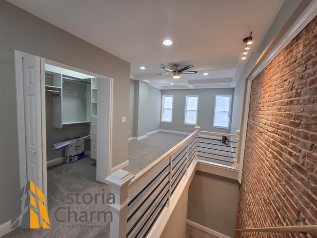 Building Photo - 4 Bedroom Rowhome with Loft Style Primary Suite and Finished Basement