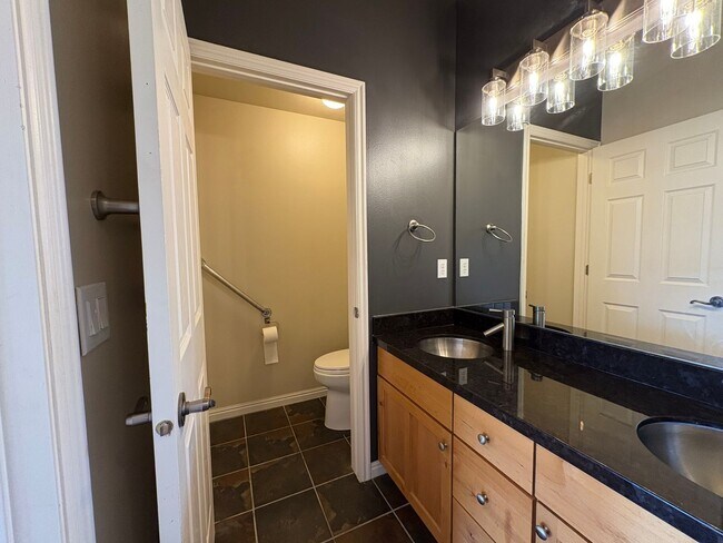 Building Photo - Charming Millcreek Condo with Scenic Balcony Views