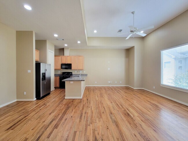 Building Photo - Elegant Gated Townhome Offering Unparallel...