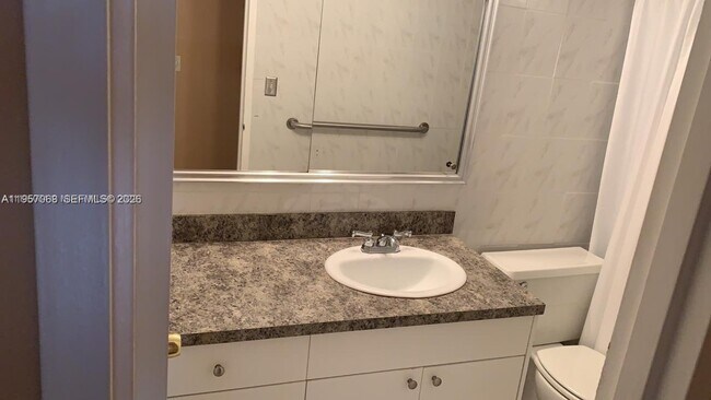 Building Photo - 3180 S Ocean Dr