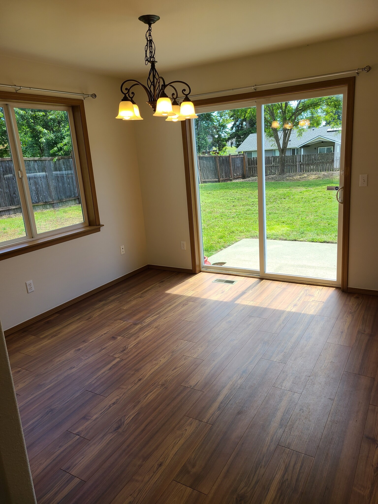 Open living space right off Kitchen. Slider goes to fully fenced back yard - 246 163rd St S