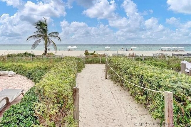 Building Photo - 18201 Collins Ave