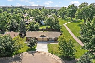 Building Photo - Immacutate, FULLY FURNISHED 2-Bed - 1 Bath Duplex with Garage & Fenced Yard in Golden!