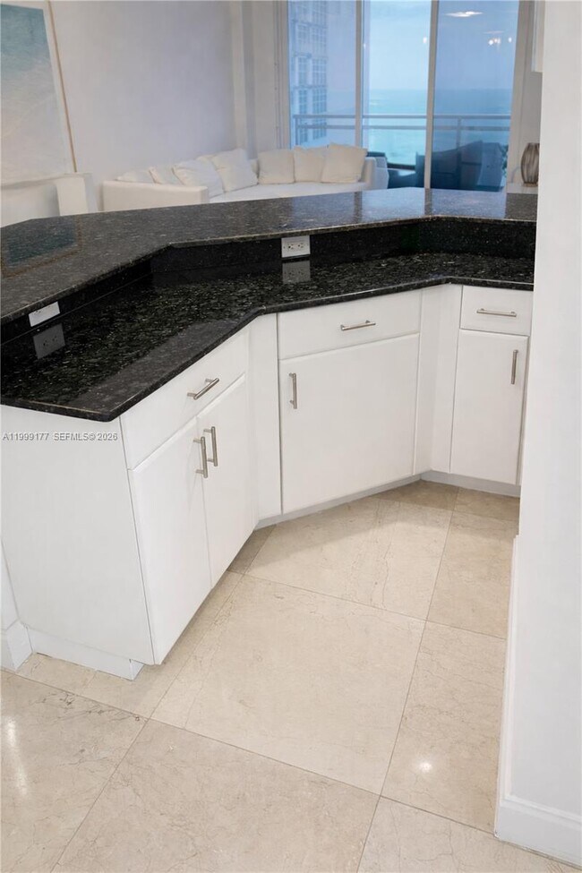 Building Photo - 6917 Collins Ave