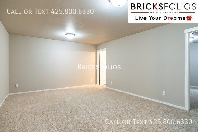 Building Photo - 4-bedroom Lynnwood gem near shops and rest...