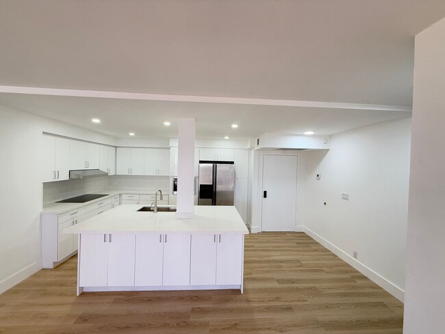 Building Photo - Steps from the beach, this remodeled 2-bed...