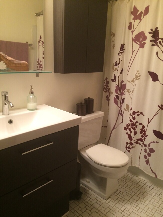 Simple, elegant updated bathroom. - 132 Demont Ave. East