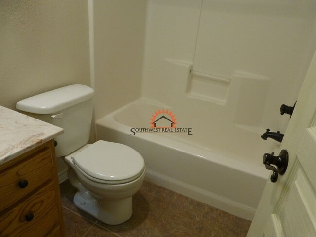 Building Photo - Stunning 4 bedroom 3 bath brick home with 5 car garage!