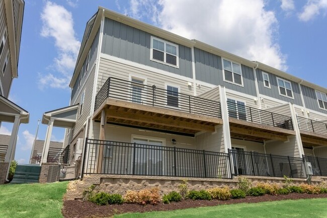 Building Photo - End Unit Townhome | Washer/ Dryer Included...