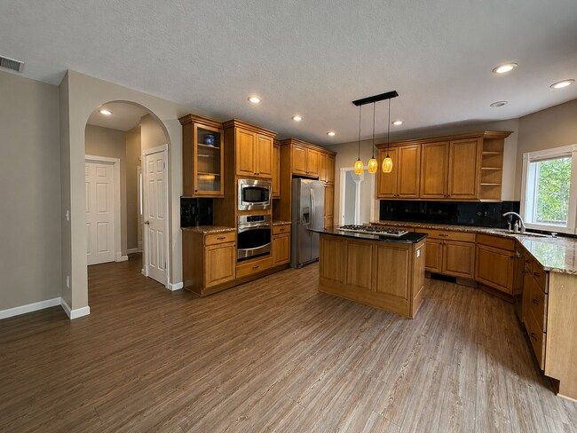 Building Photo - Light-Filled 3 Bedroom Retreat with Waterfall & Fully Fenced Yard