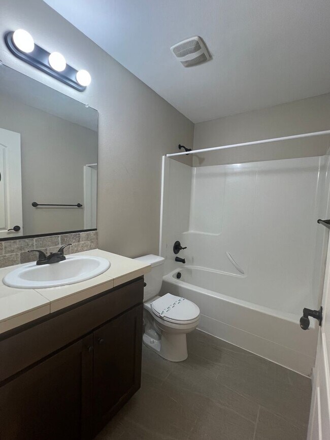 Building Photo - Recently Renovated! Spacious 3 Bedroom Home with Fenced Yard, Patio, and 2-Car Garage With Move I...