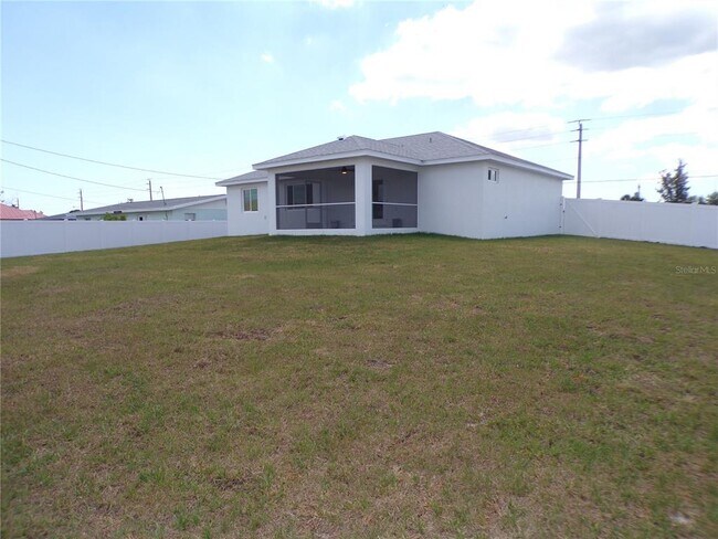 Building Photo - 3308 Port Charlotte Blvd