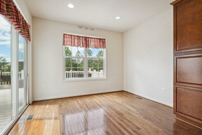 Building Photo - This beautiful townhome spans three finished levels and over 2800 square feet.