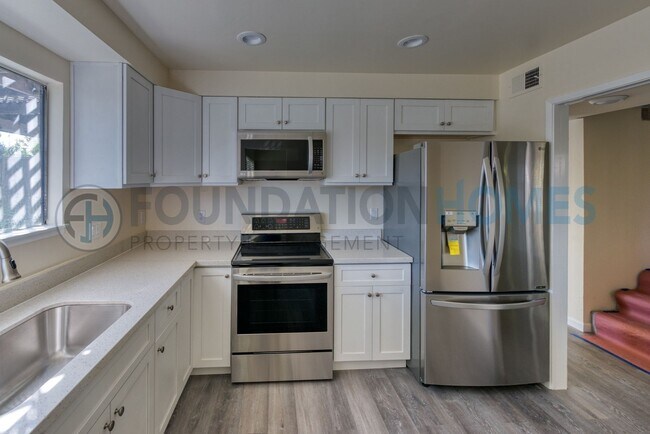 Building Photo - Renovated San Marin Townhouse | loft, A/C & 2-Car Garage - FOUNDATION