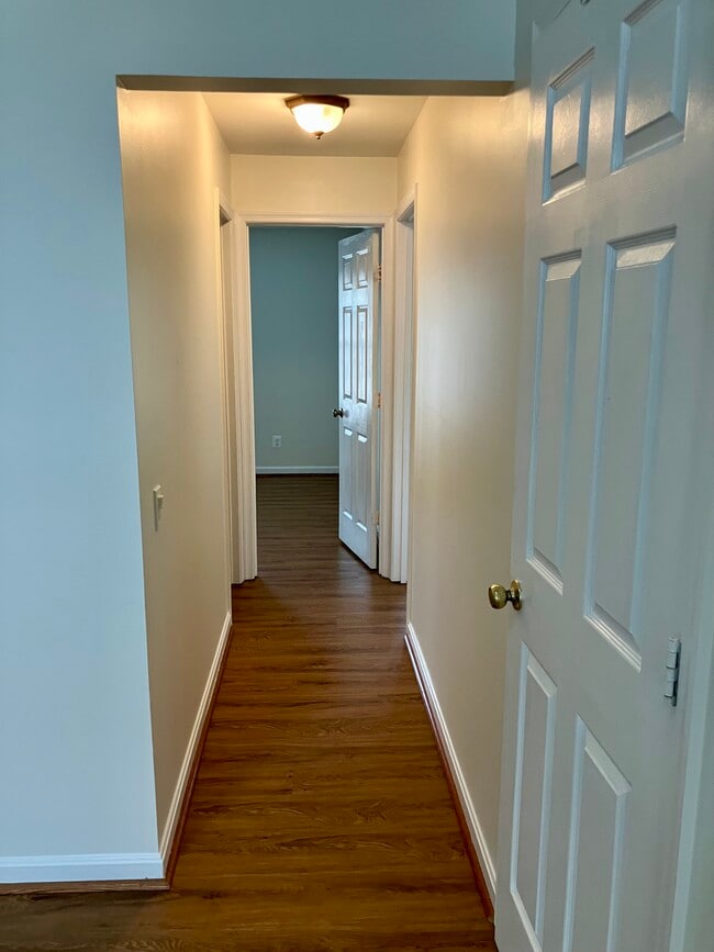 Hallway leading to bedrooms - 1137 Huntmaster Ter NE